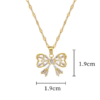 Mini Gold Bow Pendant